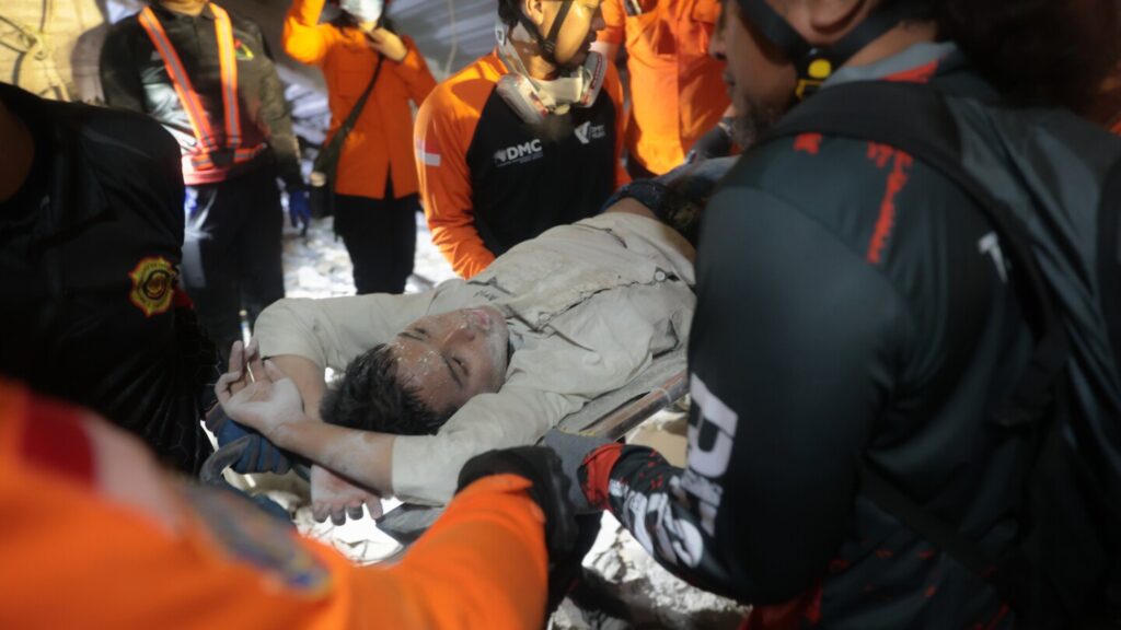 Photos from the collapse of an Islamic school building in Indonesia