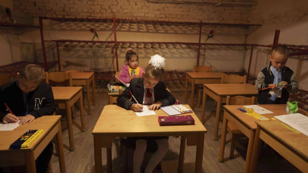 AP photographers capture Ukraine students’ first day in underground school